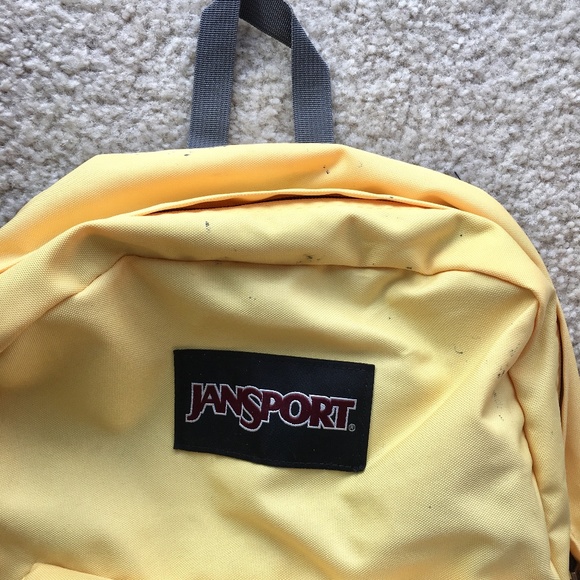 light yellow jansport backpack